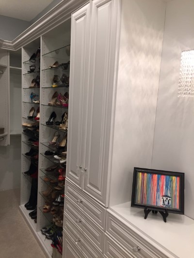 Designer Shoes on Glass Shelves